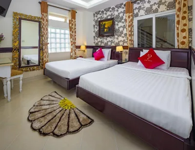 Standard-Vierbettzimmer — Pink Suite Saigon Airport Hotel